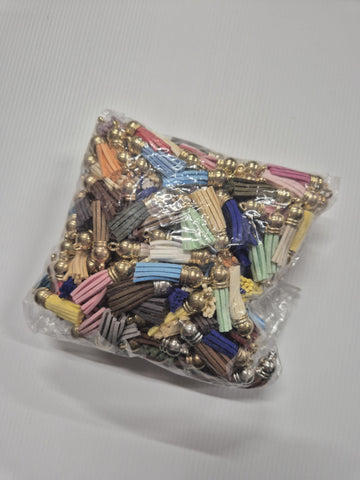 Random bag of Tassels with gold top